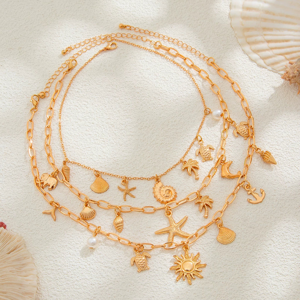 3-Piece Starfish, Conch & Scallop Necklace Set – Layered Clavicle Chain Design