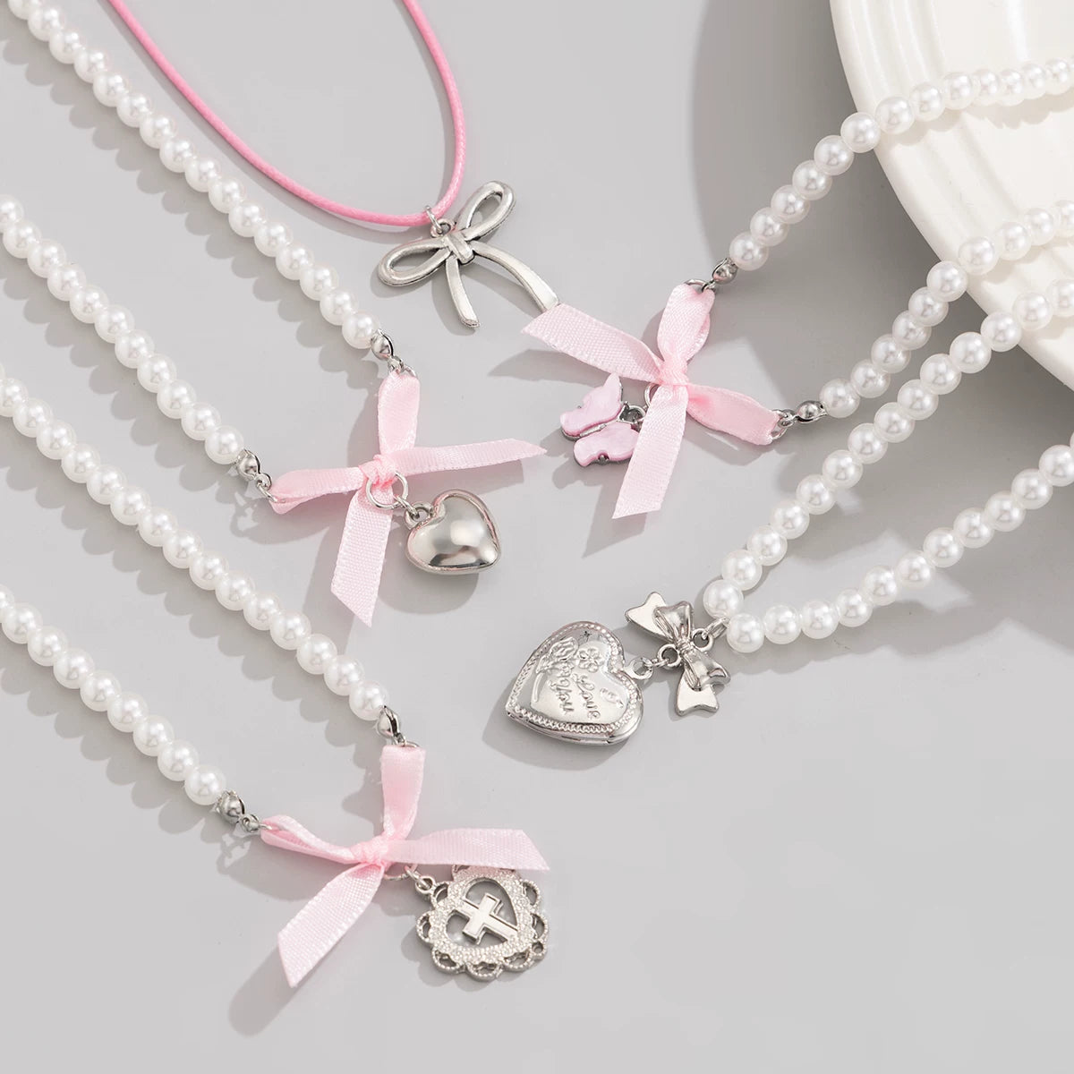 5-Piece Peach Heart & Bow Imitation Pearl Necklace Set – Layered Clavicle Chain Design