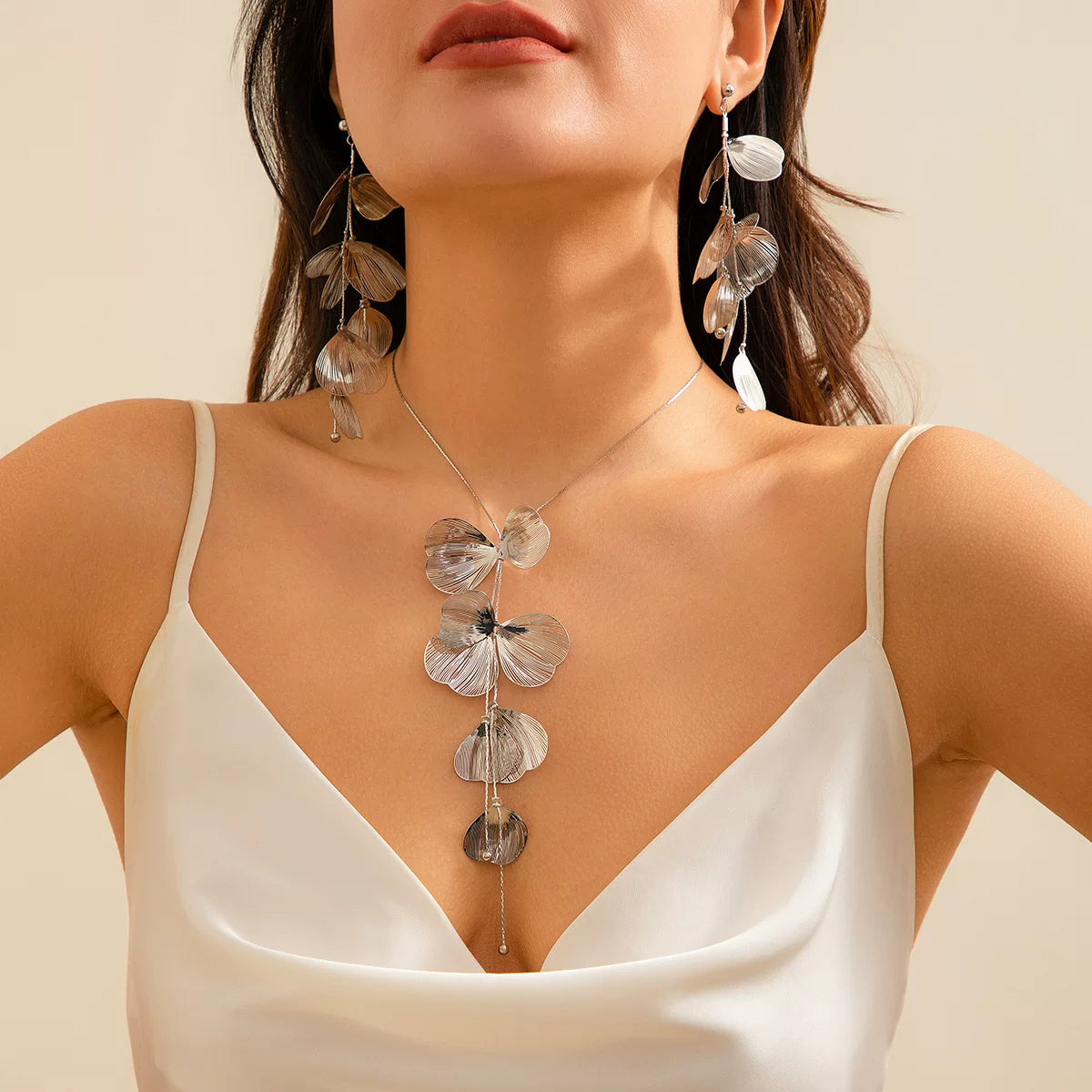 Tassel Ginkgo Leaf Gold Silk Necklace for Women – European & American 2025 Spring Trendy Niche Design Deep V Jewelry Accessory