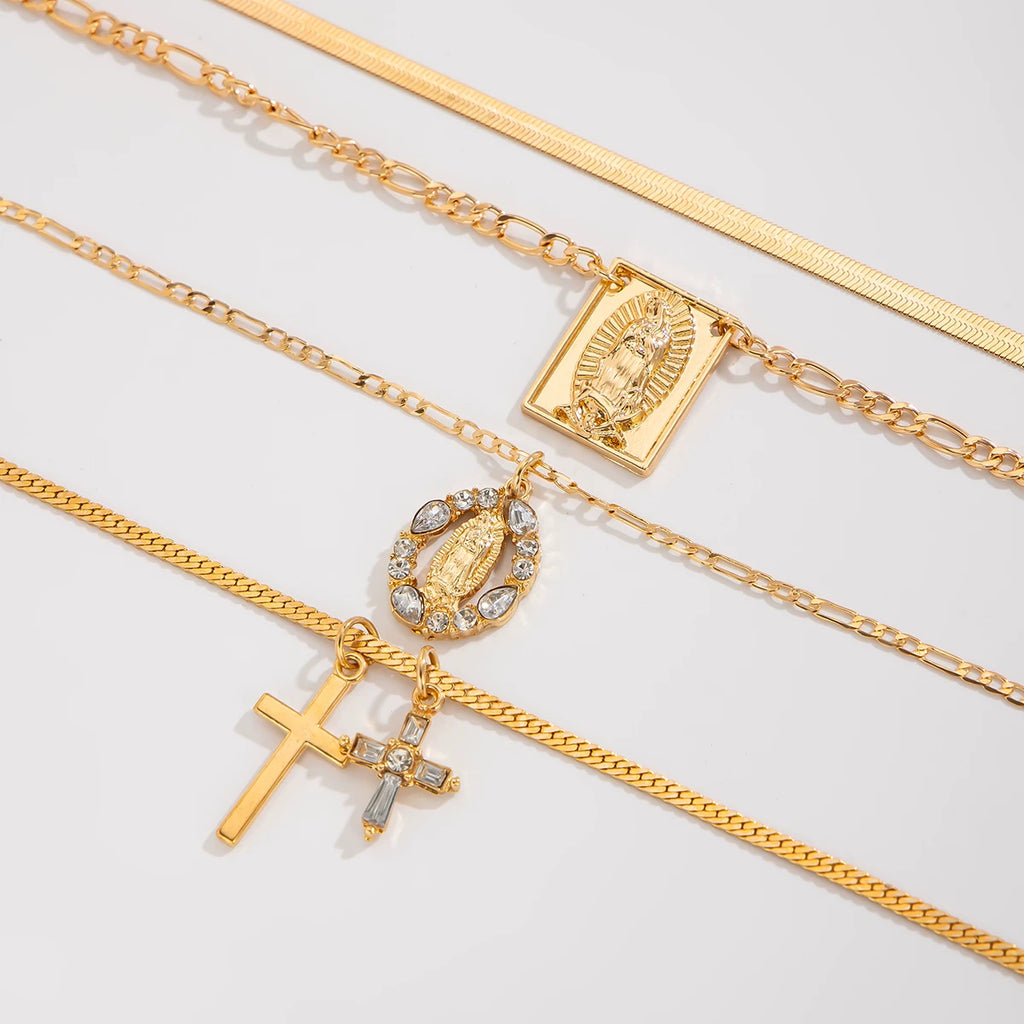 4-Piece Cross Flat Snake Bone Necklace Set – Layered Clavicle Chain Design