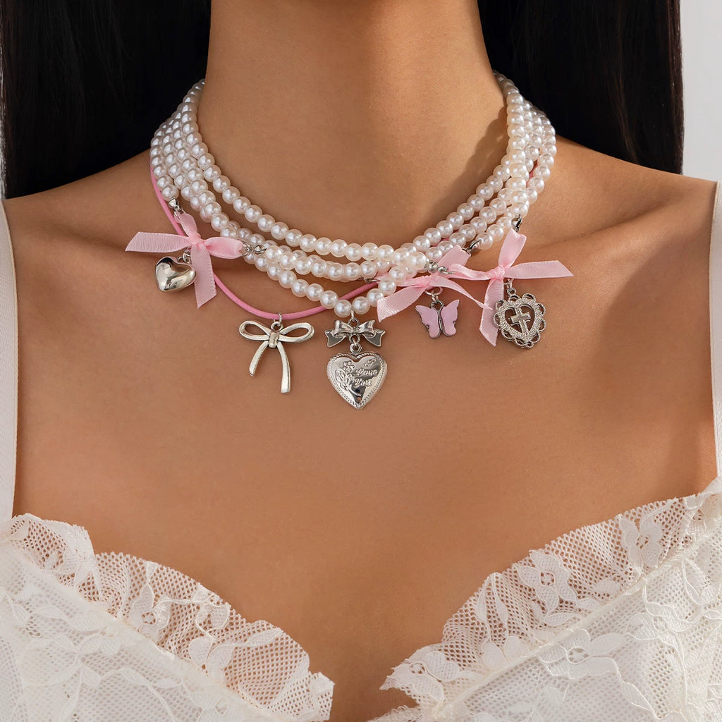 5-Piece Peach Heart & Bow Imitation Pearl Necklace Set – Layered Clavicle Chain Design